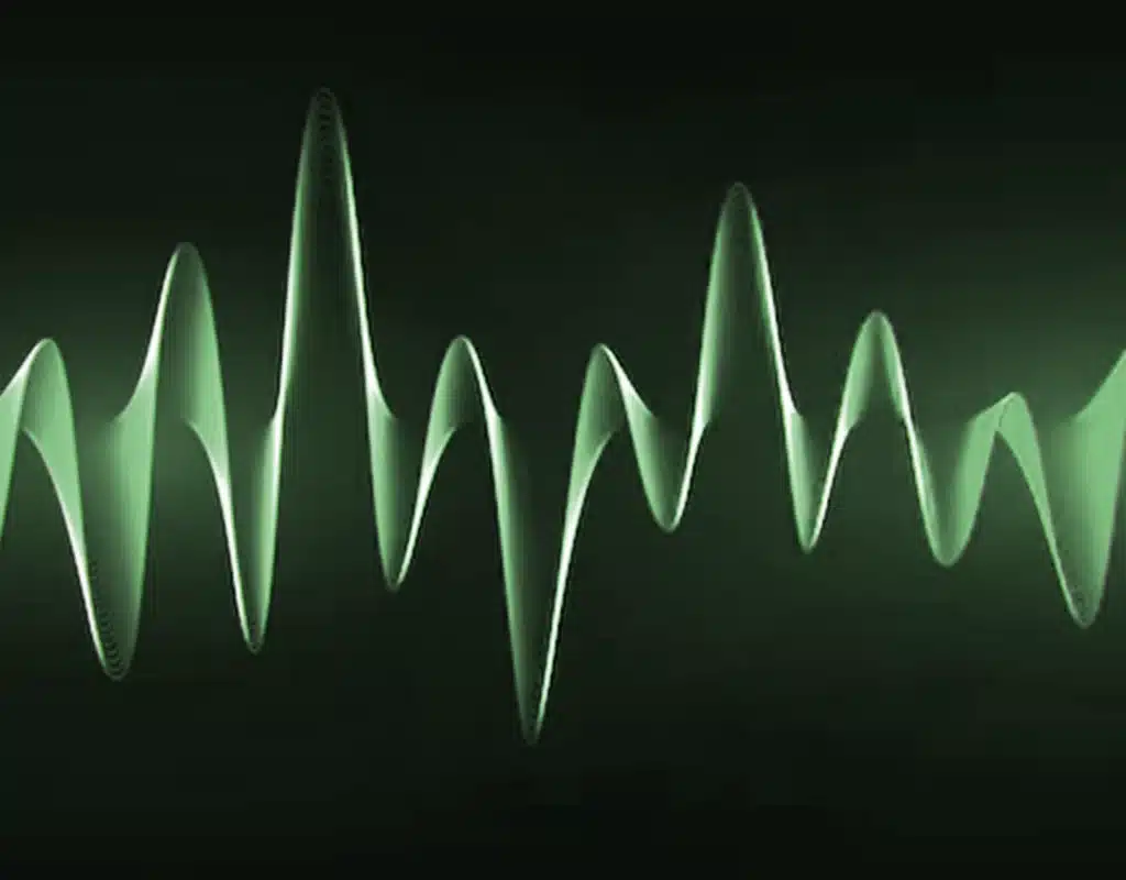 Graphique de forme d'onde sonore en vert.